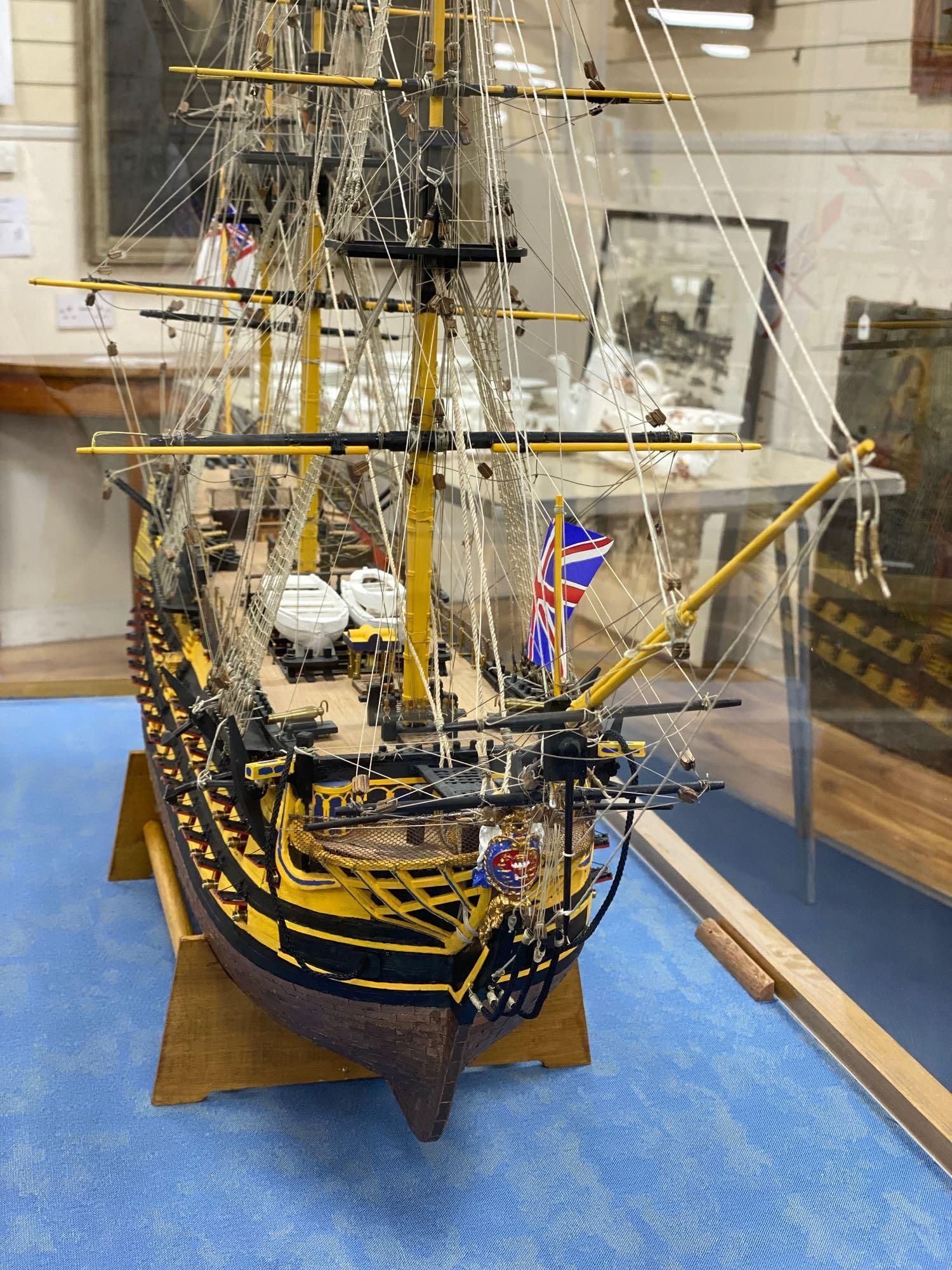 A model of the HMS Victory in perspex case, approximate length 120cm